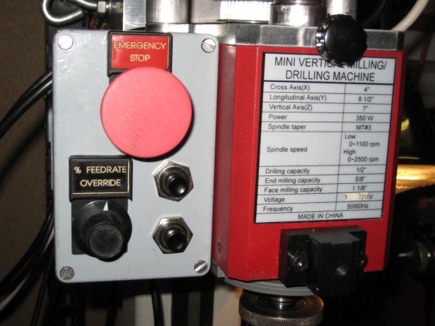 close up of Z axis controls, estop, spindle speed override encoder, and up/down