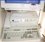 Im told this computer belongs to noah. could someone tell him to come and collect it please its in the way.