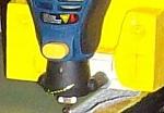 Dremel mounting taken from the tile grout cleaner kit or saw sharpener kit